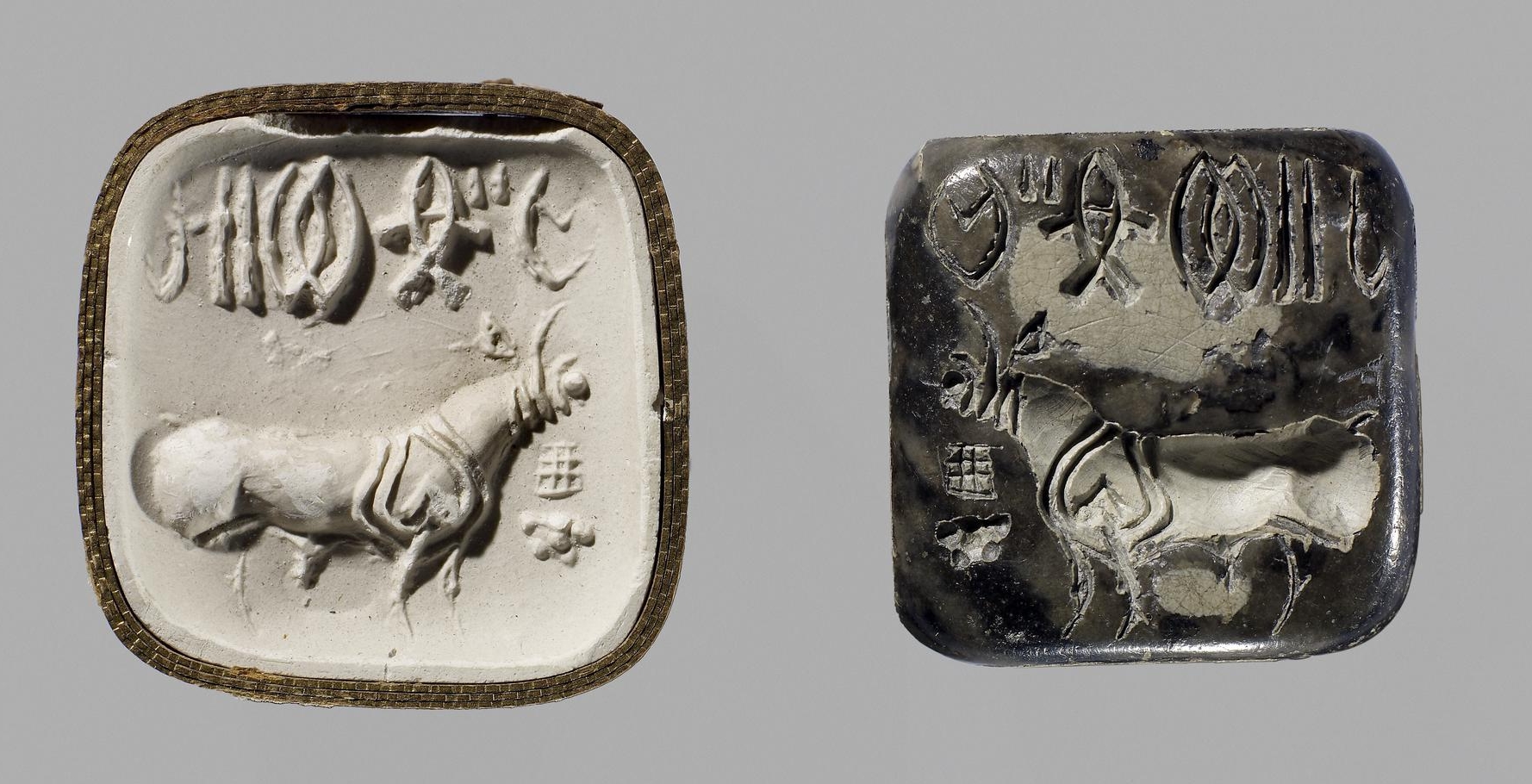 What kind of animal is depicted on the first seal?